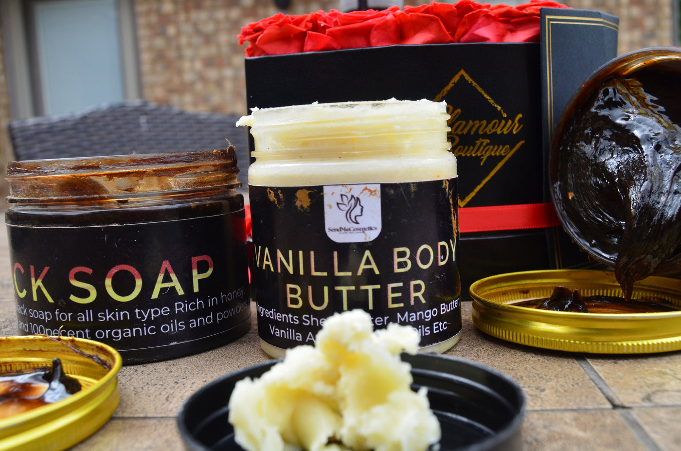 Send Me Cosmetics brand Honey Baked Black Soap (250ml) left, Vanilla Body Butter Center, Honey Baked Black Soap (500ml) right